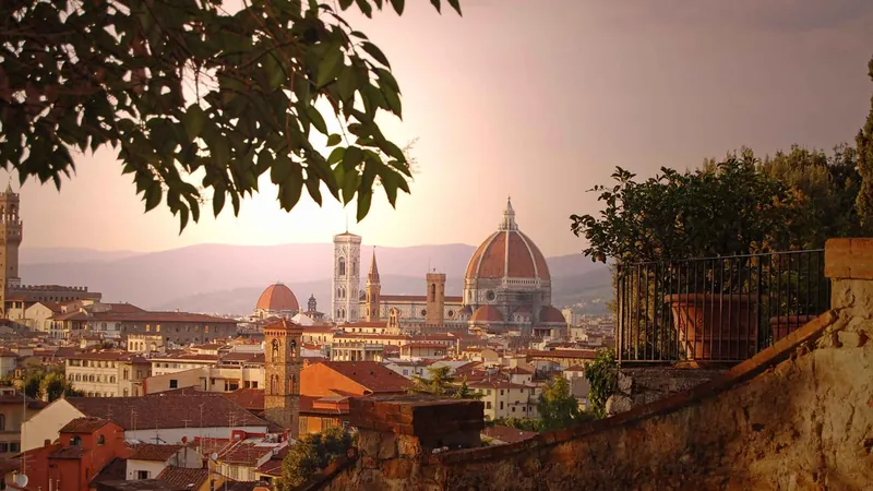 Florence Duomo and bell tower from the street on a tour from Rome to Florence